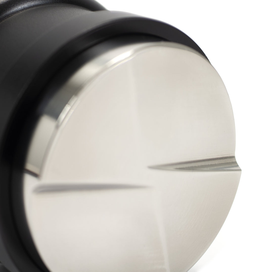 Closeup of the leveling blades and piston.