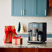 Gaggia Accademia Super-Automatic Espresso Machine on a counter next to a few gift boxes.
