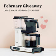 Technivorm Moccamaster KGBV Select Coffee Maker in Off White with promotional text that reads "February Giveaway - Love your mornings again".