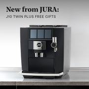 A black JURA J10 Twin Super-Automatic Espresso Machine sits on a countertop against a light gray background. Text at the top reads 'New from JURA: J10 TWIN PLUS FREE GIFTS'.