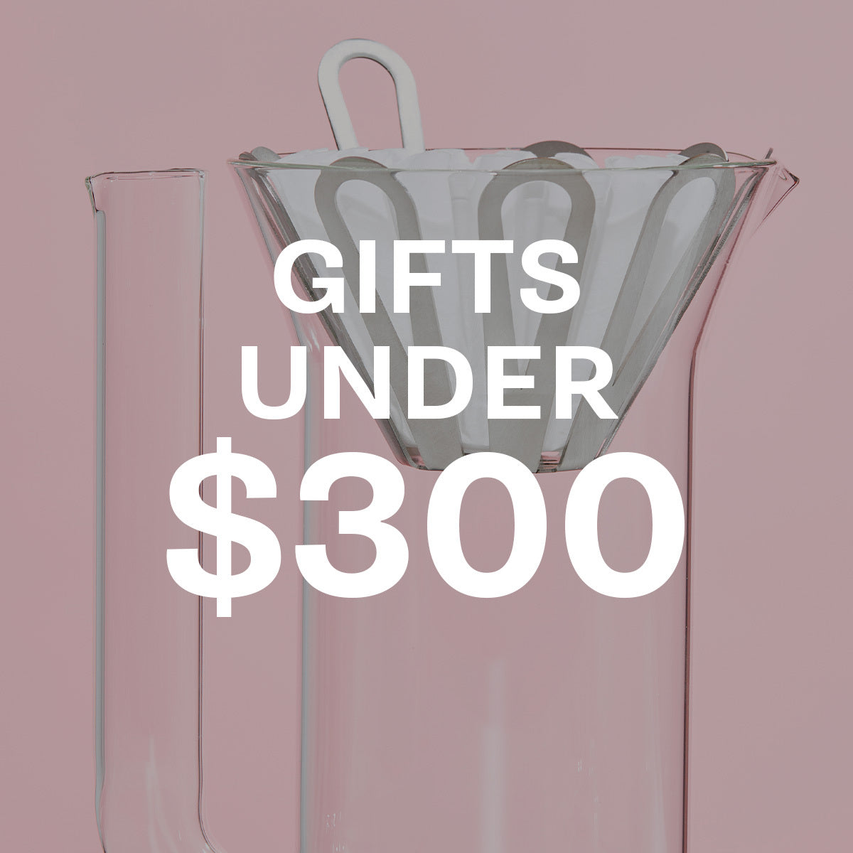 E&B Labs Pour Over set on a pink background with text overlayed that reads "Gifts Under $300".