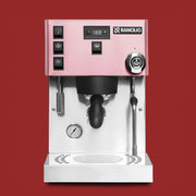 Rancilio Silvia Pro X Espresso Machine in Pink on a red background.