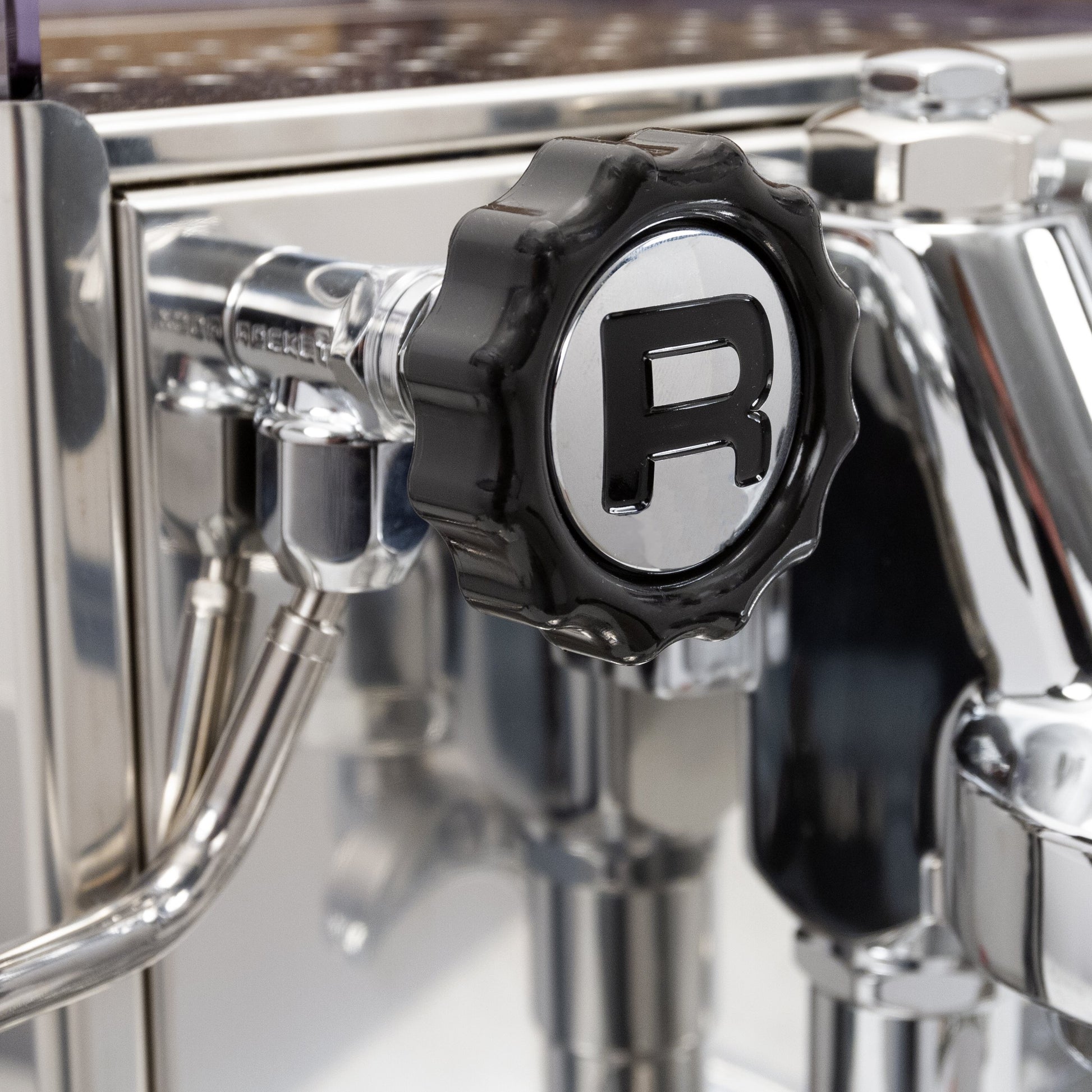 Steam knob, emblazoned with Rocket Espresso's "R"