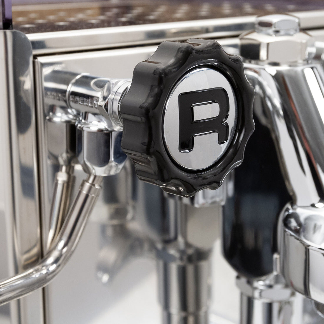 Steam knob emblazoned with Rocket Espresso's "R"
